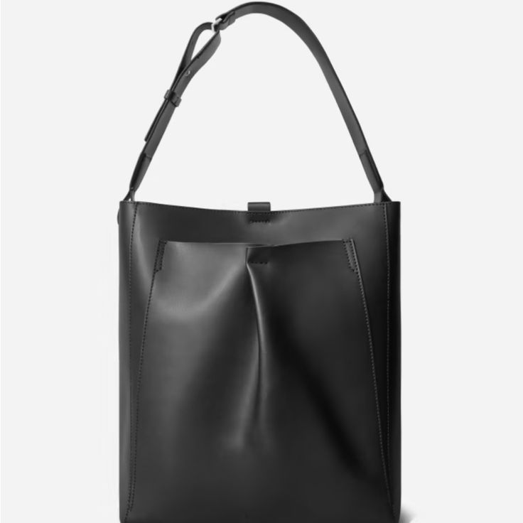 Everlane The Studio Bag New With Tags! Color: Black Modern Everyday Bucket Bag With Magnetic Closure, Black Hobo Bag With Magnetic Closure, Black Hobo Bag With Magnetic Closure Tote Shape, Black Rectangular Hobo Bag With Magnetic Closure, Black Bucket Bag With Detachable Handle For Work, Minimalist Shoulder Bag With Magnetic Closure, Modern Rectangular Hobo Bag With Magnetic Closure, Sleek Black Bag With Magnetic Closure, Sleek Black Bags With Magnetic Closure