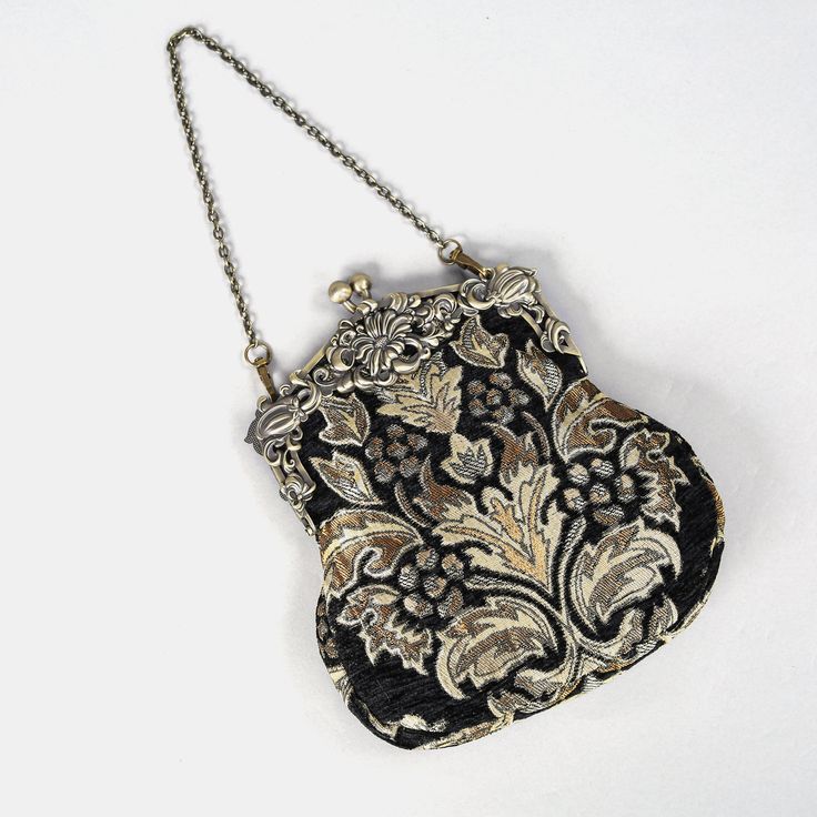 Introducing our captivating collection of Chatelaine purses, inspired by the elegance of the Victorian era.Available in three sizes—Large, Medium, and Small—these purses offer versatility and style. The Large and Medium sizes can be used as both a clutch and a crossbody purse, as we provide two chains for each size: 50" and 13" in length. This allows you to effortlessly switch between crossbody and clutch styles.Let's focus on the Chatelaine Large Crossbody Purse:With a frame width of 6.25" and Vintage Pouch Clutch For Formal Events, Vintage Clutch With Removable Pouch For Formal Occasions, Vintage Clutch With Removable Pouch For Formal Events, Classic Evening Coin Purse With Removable Pouch, Classic Coin Purse With Removable Pouch For Evening, Chic Rectangular Bags For Vintage Events, Chic Rectangular Bag For Vintage Events, Classic Evening Coin Purse Clutch, Classic Evening Clutch Coin Purse