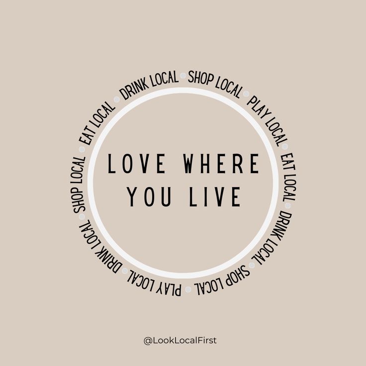 the words love where you live are written in black on a white circle that says,