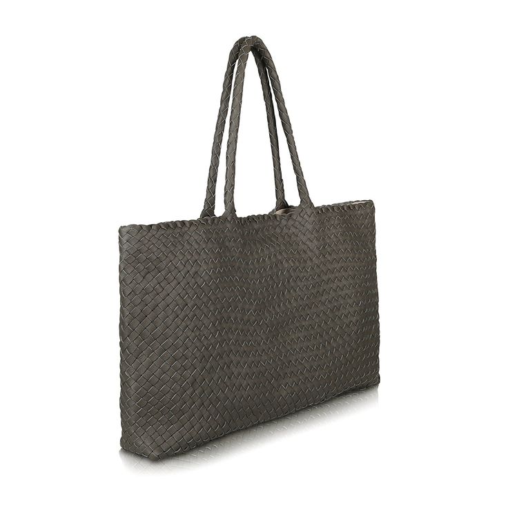 · Made from 100% Vachetta, Nappa or Suede leather · Handcrafted The Travel Elena is a classic leather tote bag with a striking pattern upgrade. Handwoven in Italy using genuine Vachetta, Nappa or Suede leather, this buttery-soft woven bag features a 100% cotton lining, magnetic top closure and two zippered interior pockets to keep belongings safe and sound. A Vachetta leather handbag is the ultimate investment piece; it's the only kind of leather that naturally darkens with use to develop a deep Luxury Large Capacity Straw Tote Bag, Luxury Bags With Interwoven Design And Double Handle, Luxury Woven Bag With Double Handles, Luxury Shoulder Bag With Interwoven Design For Travel, Everyday Double Handle Bag With Interwoven Design, Everyday Use Bags With Interwoven Design And Double Handle, Luxury Woven Leather Straw Bag For Travel, Woven Leather Tote Bag For Shopping, Natural Leather Bag With Interwoven Design