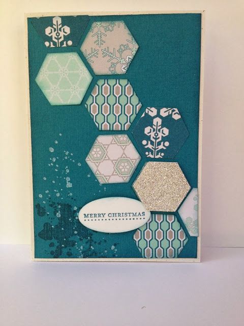 a christmas card with hexagons and snowflakes