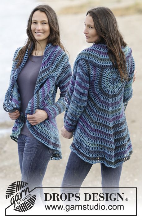 two women standing next to each other wearing crocheted sweaters and jackets with open shoulders