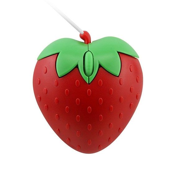 a red and green strawberry shaped object hanging from a string