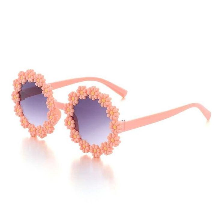 Adorable Daisy Flower Sunglasses for Your Little Sunshine Brighten up your child's day with our Kids Round Daisy Flower Sunglasses! Designed for outdoor sun protection, these charming and whimsical shades add a dash of retro flair to any outfit. The round frames, decorated with cute daisy petals, come in six cheerful colors, perfect for any little girl's sunny adventures. Whether it's a family outing, beach day, or festival party, these sunglasses will help your child step out in style while keeping their delicate eyes safe from harmful UV rays. Outstanding Features of Kids Daisy Sunglasses Retro Fashion: Cute round daisy flower frames capture the playful spirit of the past while adding a modern, fun twist. Six Vibrant Colors: Choose from a range of colorful frames to match your child's pe Pink Round Frame Sunglasses For Spring, Playful Polarized Sunglasses For Spring, Playful Flower-shaped Plastic Sunglasses, Cute Adjustable Sunglasses For Spring, Cute Sunglasses With Uva Protection For Spring, Cute Flower Shaped Sunglasses With Uv Protection, Cute Adjustable Sunglasses For The Beach, Cute Sunglasses With Gradient Lenses For Spring, Adjustable Pink Sunglasses For Beach