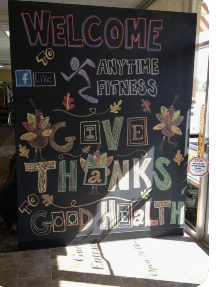 a welcome sign in front of a window with the words give thanks and good health written on it