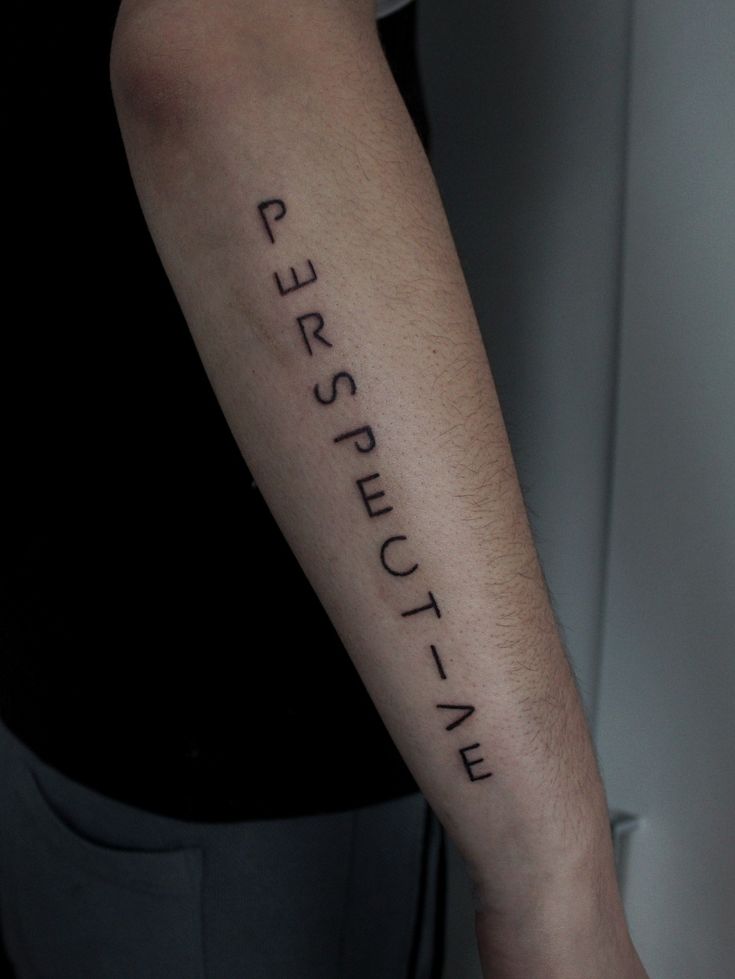 a person with a tattoo on their arm that says perseptetic 4 me