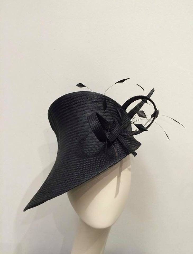 Stunning black parasisal headpiece, stiffened and hand blocked over millinery wooden hat block. All materials used to make the hats are of top quality and the hat blocks have been made to order by Boon & Lane in Luton, England. This type of parasisal straw is of the best quality and is used for the most sophisticated and luxurious hats. The hat is finished with a grosgrain petersham headsize band inside. HANDSEWN The original and stylish embellishment is composed by sophisticated feather trim en Luxury Black Hat With Rhinestones, Adjustable Top Hat With Structured Crown For Church, Elegant Black Adjustable Bonnet, Elegant Adjustable Black Bonnet, Adjustable Cloche Headpiece For Church, Adjustable Top Hat With Pinched Crown For Kentucky Derby, Adjustable Black Cloche Hat For Church, Black Cloche Fascinator With Adjustable Fit, Adjustable Costume Hats With Pinched Crown For Church