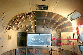 the inside of an rv with many items on it's walls and flooring