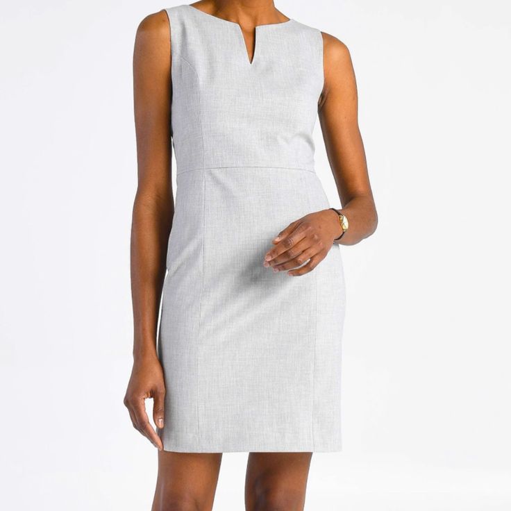 The Of Mercer Sterling Dress Stands Out With Its Precision Tailoring And Elegant Notch Neckline. The Gently Waist-Defining Sheath Silhouette Is Beyond Flattering, And Its Crisp, Lightweight And Works For Every Season. Made In Nyc. Color: Gray Size: 10 Machine Wash Cold Permanent Press, Do Not Bleach, Do Not Tumble Dry, Medium Iron. Dry Cleanable 67% Polyester / 29% Viscose / 4% Elastane Classic H-line Office Dresses, Classic V-neck Sleeveless Dress For Work, H-line Dresses For Spring Workwear, H-line Spring Dress For Work, Elegant Shift Dress With V-neck, Spring Workwear H-line Dress, Classic Fitted V-neck Sleeveless Dress, Sleeveless Shift Midi Dress For Work, Elegant Lined Office Dress