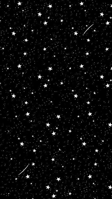 stars in the night sky with one falling