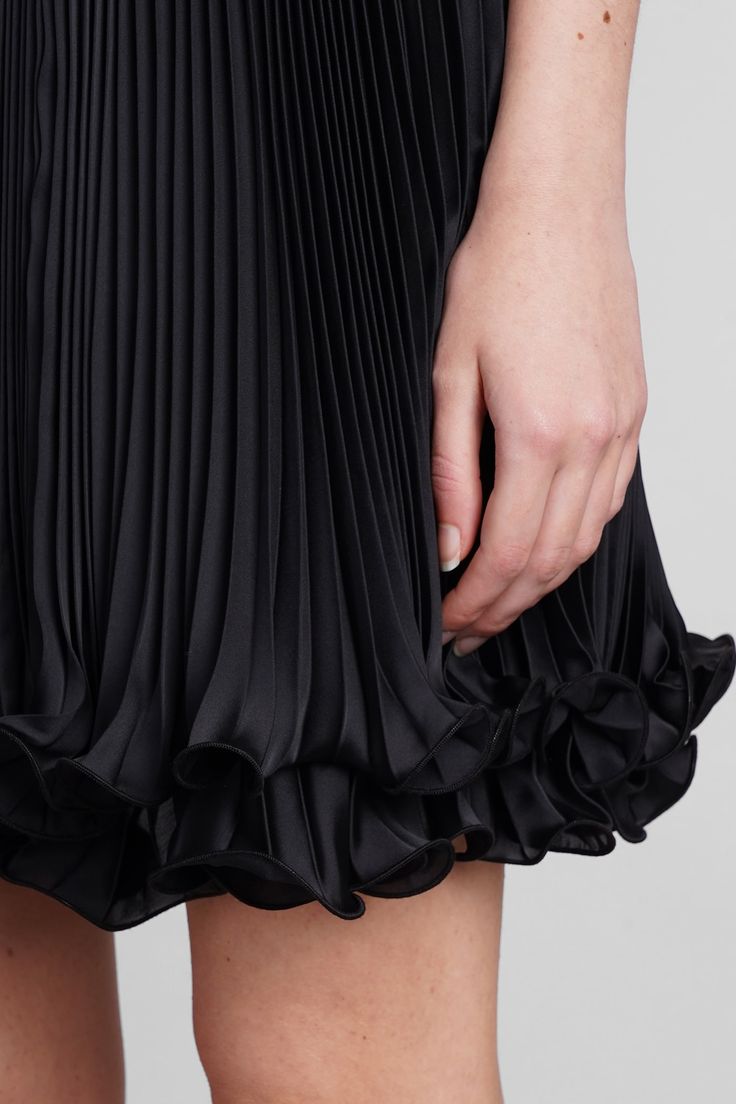 100% Polyester Black Ruffled Skirt For Cocktail, Elegant Ruffled Mini Skirt For Formal Occasions, Black Flared Pleated Skirt For Evening, Chic Accordion Pleats Skirt For Evening, Spring Black Pleated Skirt With Ruffles, Elegant Formal Mini Pleated Skirt, Elegant Black Skirt With Accordion Pleats, Black Party Skirt With Folds, Black Evening Pleated Skirt With Accordion Pleats