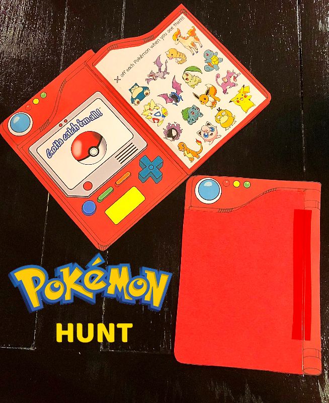 the pokemon hunt game is on display next to an orange folder and red clipboard