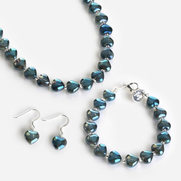 Carrie Elspeth Blue Shine Hearts Full Necklace
Add a pop of colour and a touch of class to any outfit with this blue shine hearts full necklace. The full length of the necklace is decorated with heart-shaped beads in metallic blue. Each shimmering bead has an electroplated finish, which means them positively shine, and is separated with a small clear spacer bead allowing the statement bead to stand out.
The ideal piece of jewellery to accompany any outfit day or night, this stunning blue shine heart full necklace makes a wonderful gift for the person you cherish most, these heart shaped beads symbolize love, friendship and affection. Paired with the matching bracelet and earrings they will make a sophisticated accessory.
About This Necklace
Carrie considers the necklace to be the flagship Hearts Bracelet, Hearts Earrings, Contemporary Accessories, Bottle Jewelry, Bee On Flower, Matching Bracelet, Jewellery Set, Metallic Blue, Glass Heart