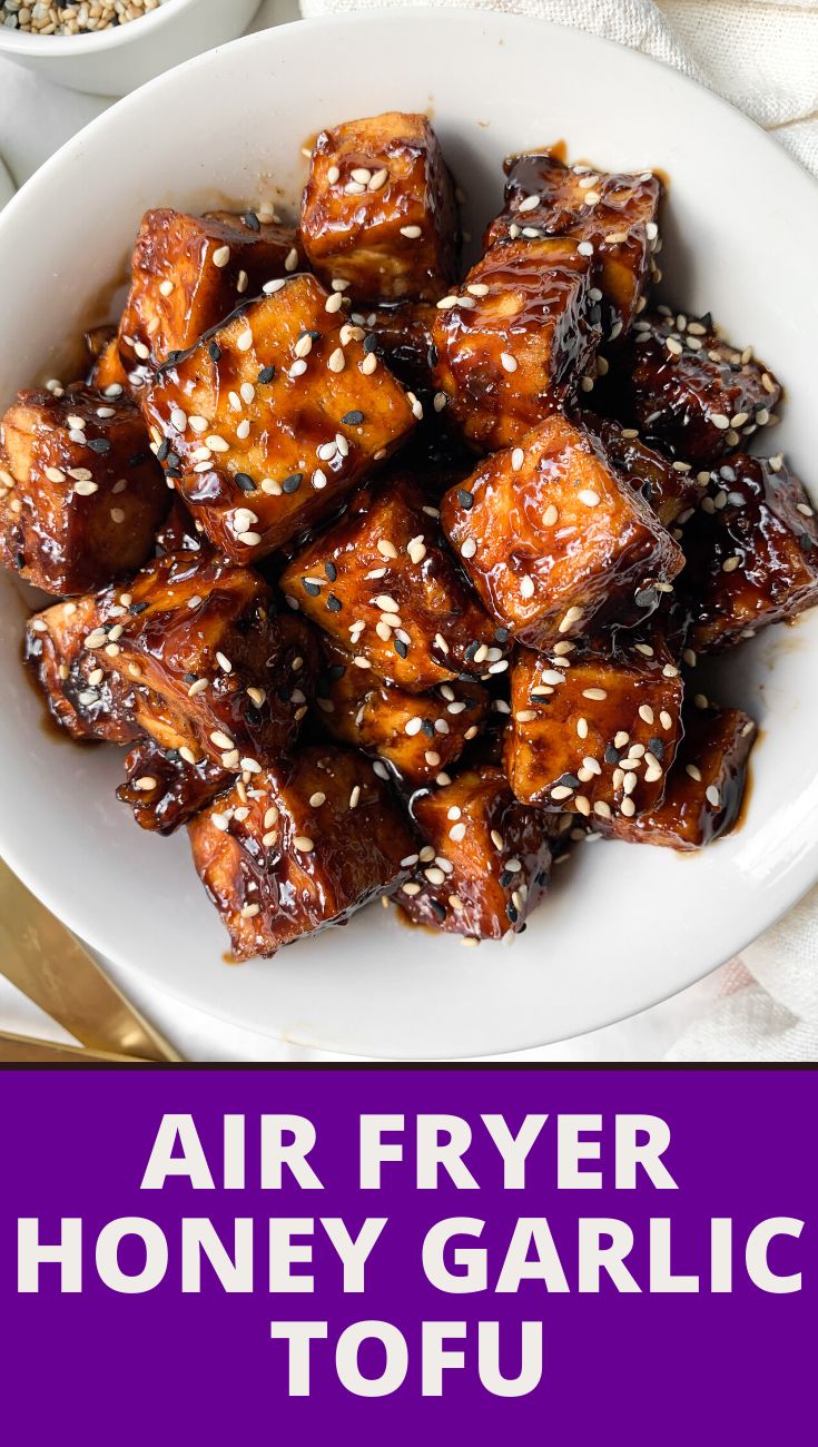 an air fryer honey garlic tofu on a white plate