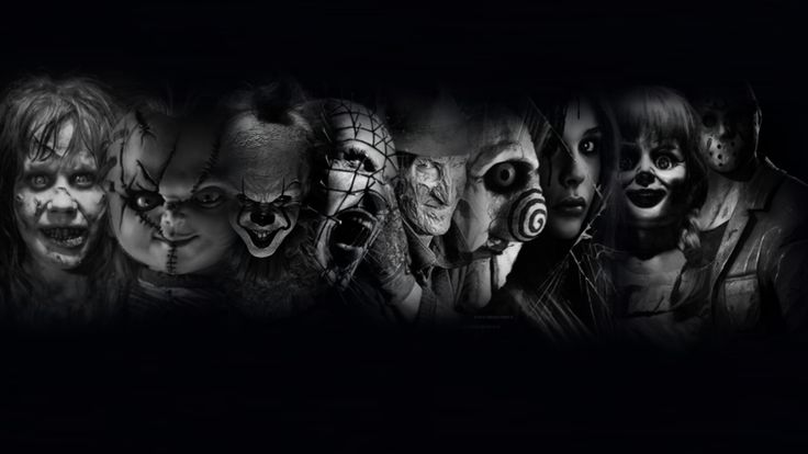 a group of scary clowns with their faces painted black and white in the dark