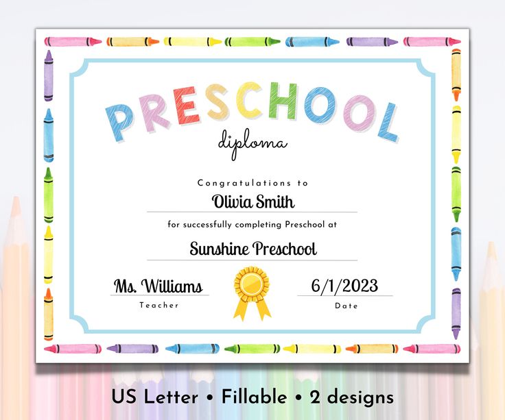 a certificate with crayons and pencils in the background that says preschool diploma