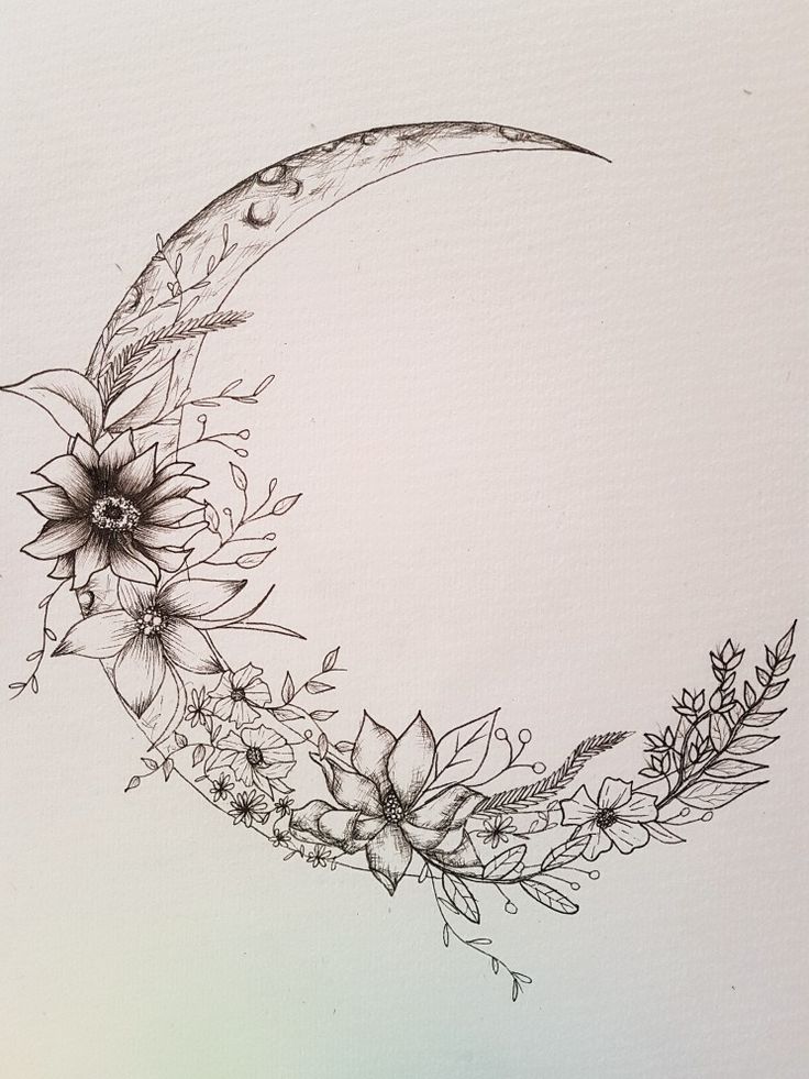 a drawing of a crescent with flowers on it