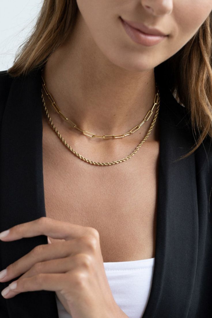 Sometimes you need something bizarre and simple. Bold and super trendy, our Rope and Link layered chainset comes into this! Add the fantastic texture of two chains to your everyday go-to! #rope #paperclipchain# #layerdnecklace #chains #goldnecklace #goldchainnecklace #necklaces #daintygoldnecklaces #layernecklace #necklacegold Trendy Multi-strand Layered Chain Necklace, Everyday Layered Link Chain Necklace, Trendy Layered Snake Chain Necklace, Everyday Double Strand Metal Chain Necklace, Metal Chain Necklace With Adjustable Chain For Layering, Metal Link Layered Necklace With Chain Detail, Metal Link Chain Layered Necklace, Metal Adjustable Chain Necklace For Layering, Adjustable Metal Chain Necklace For Layering