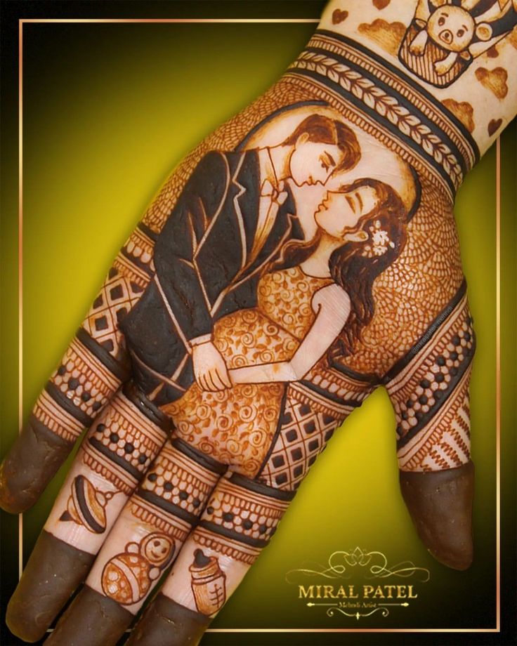 a woman's hand painted with an image of a man and woman on it