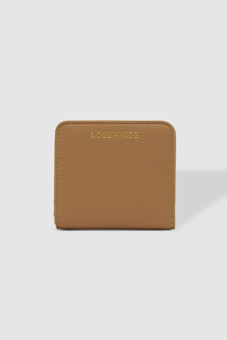 The Louenhide Lily Wallet is perfect for minimalists who want a sleek and efficient way to carry their essentials. With seven cardholders and a secure zip pocket, you'll never fumble for the right card or loose change again. Made from luxe vegan leather, its slim profile fits easily into any pocket or bag without adding bulk. Internal features: 7 cardholders External features: 1 zip pocket Internal lining: Polyurethane vegan leather Closure: Secure zip Material: Polyurethane vegan leather Hardwa Neon Buddha, Duster Dress, Bryn Walker, Loose Change, Miz Mooz, Fly London, Wallet Fashion, Flat Sneakers, Pump Sandals