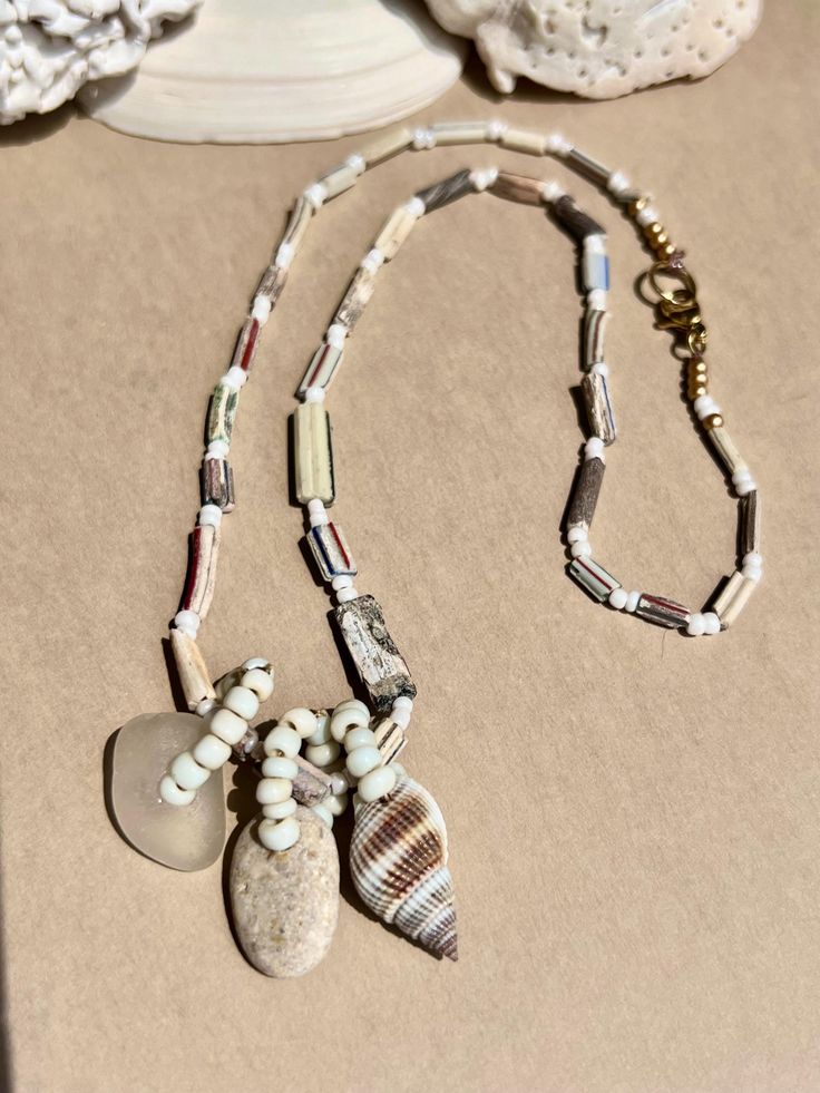 Necklace 18 inches/ Rare White Afghani Ancient Roman Glass Tube Beads /natural shell charm/ stone charm/ boho Ancient Roman Glass, Roman Glass, Tube Beads, Etsy Jewelry, Natural Beads, Pendant Necklaces, Jewelry Necklace Pendant, Shells, Jewelry Design