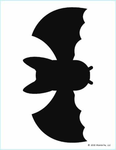 a black and white silhouette of a bat with its wings spread out to the side