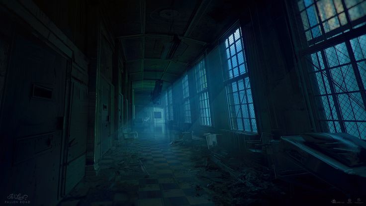 an empty hallway with lots of windows in the dark and creepy looking building at night