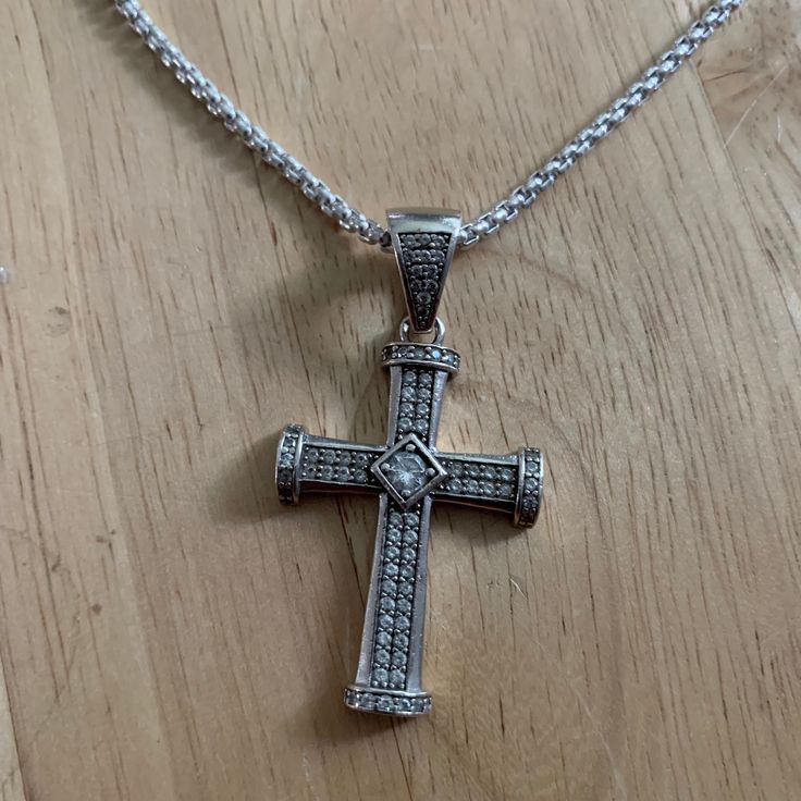 "This listing is for a Vintage 2\" by 1\" (including nice size bail) Sterling Silver CZ Cubic Zirconia Encrusted Cross Pendant ONLY. NOTE: Sterling Silver Rope Chain and David Yurman Chain in photo NOT INCLUDE, but may still be available on my Etsy Store. The stones provide beauty and elegance of a colorless diamond-like stones. Religious Christian CZ Pendant ONLY. The bail is Stamped 925 Pendant weight is approx. 10.8 grams Approx. 26.7mm by 50mm (including bail) Approx. 10.8 grams REF: \"CZ He Diamond Cross Pendant Jewelry With Bling, Diamond Cross Jewelry With Rhinestones, Cross-shaped Diamond Jewelry With Rhinestones, Crystal Cross Pendant With Rhinestones, Crystal Rhinestone Cross Pendant Jewelry, Crystal Cross Pendant Jewelry With Rhinestones, Crystal Jewelry With Diamond Accents, Cross Pendant, Sterling Silver Cross Jewelry With Bling, Cross Shaped Crystal Jewelry With Diamond Accents