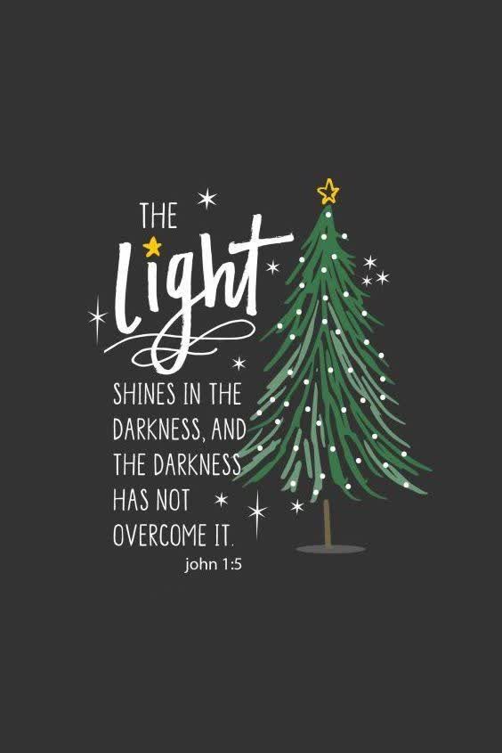 the light shines in the darkness and the darkness has not overcome it christmas tree