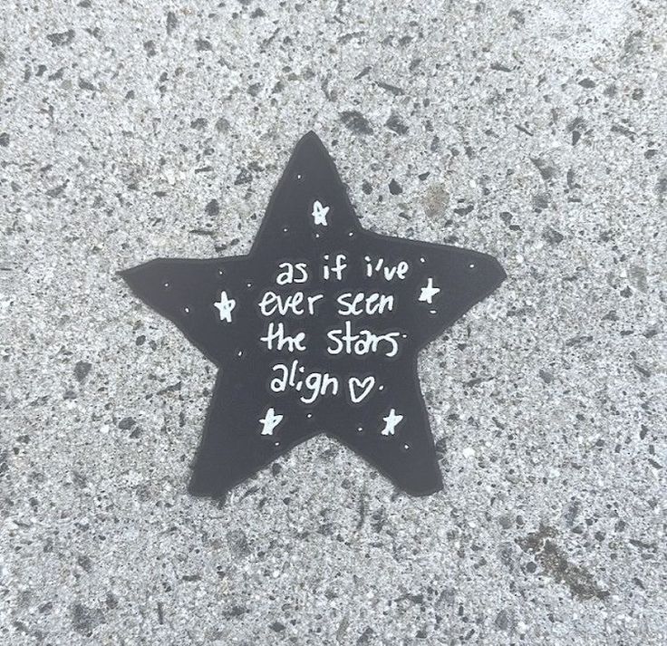 a black star with writing on it that says, as if we ever seen the stars align us