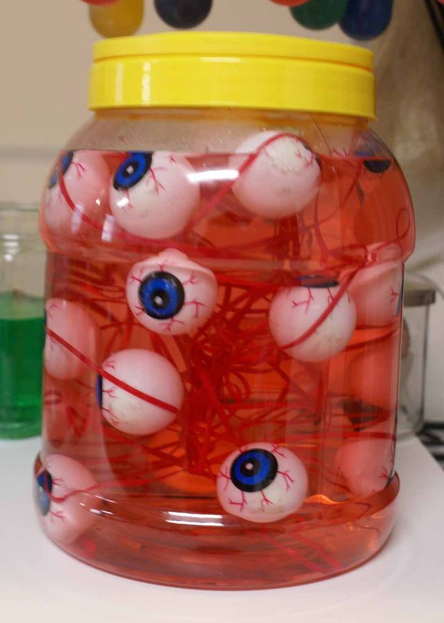 a jar filled with lots of fake eyeballs