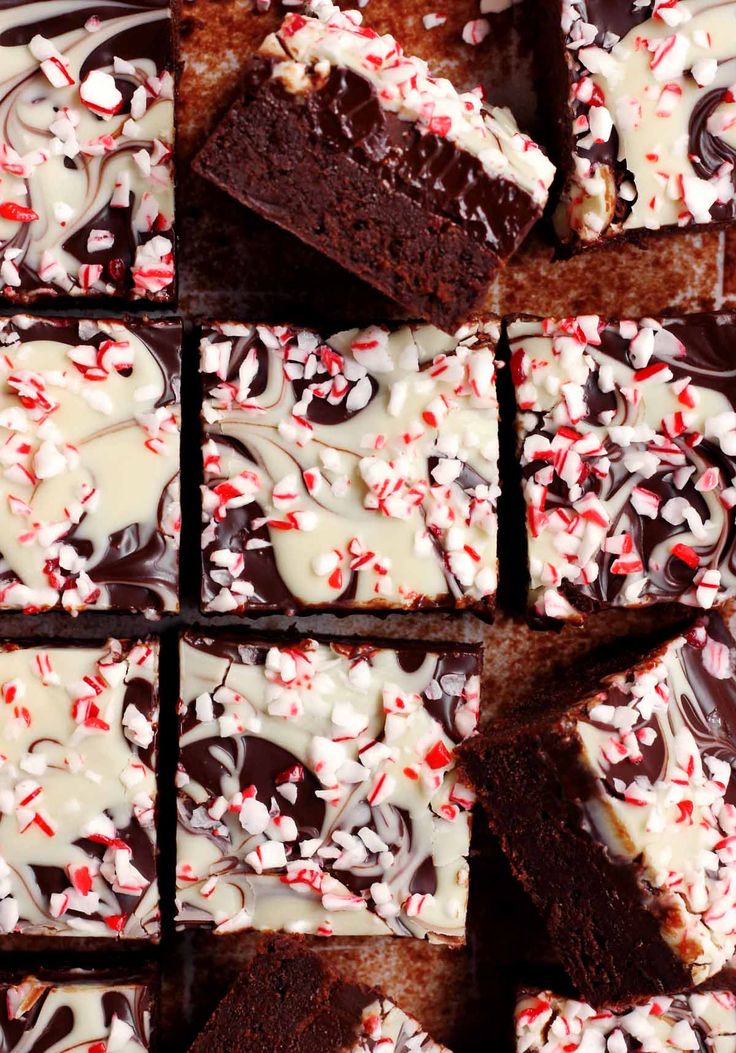 chocolate peppermint brownies with white frosting and candy canes on top