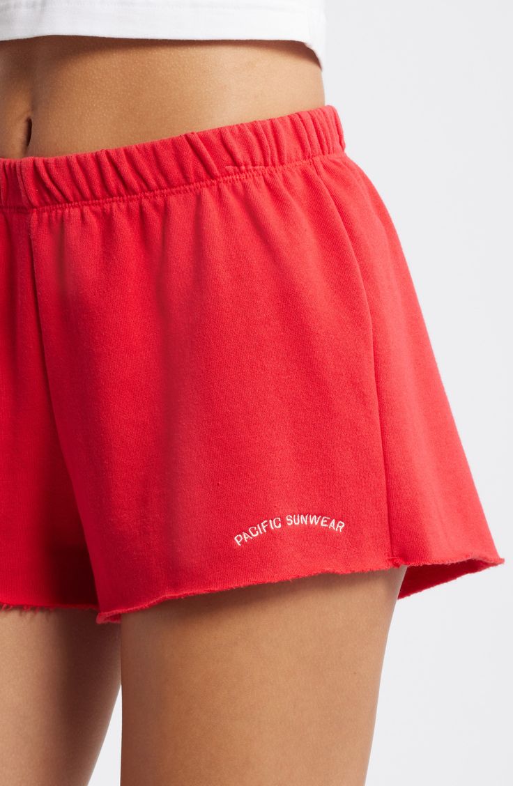 These extrasoft French-terry shorts are made of a cotton blend and topped with a stretchy elastic waist. 2 1/2" inseam; 28" leg opening; 10" front rise; 15" back rise (size Medium) Elastic waist 60% cotton, 40% polyester Machine wash, tumble dry Imported Red Cotton Sporty Athletic Shorts, Sporty Cotton Pajama Shorts For Vacation, Sporty Red Cotton Athletic Shorts, Comfortable Red Relaxed Fit Bottoms, Red Relaxed Fit Comfortable Bottoms, Cotton Athleisure Shorts For Vacation, Cotton Athletic Shorts For Vacation, Summer Cotton Athletic Shorts With Comfort Waistband, Sporty Cotton Shorts For Vacation