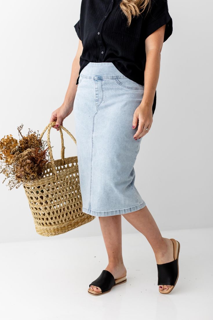 This soft denim skirt has a vintage wash for that lived in look we love! It is made from a quality, stretch denim to ensure a modest and flattering fit. Featuring a wide waistband for extra comfort and easy styling. This skirt was designed with everyday wear in mind and will pair well with just about any casual top in your wardrobe. Exclusively designed by us for you! 75% Cotton 23% Polyester 2% Spandex Wash Cold Gentle Cycle Hang to Dry Low Iron Model Height 5'2" | Wearing Size 4 in 26" Length Knee Length Denim Skirt, Denim Skirts Knee Length, Modesty Outfits, Apostolic Fashion, Denim Skirt Outfits, Modest Skirts, Wardrobe Edit, Denim Skirts, Nice Style