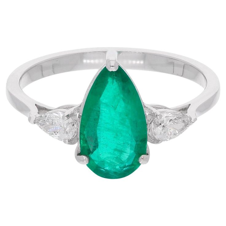 Make a statement with this stunning Gold Diamond Emerald Ring from our collection, designed to add a touch of timeless elegance to your jewelry collection. Crafted from 18k solid white gold, this ring features a dazzling emerald at the center. This ring is available in 10k/14k/18k, Rose Gold/Yellow Gold/White Gold. This is a perfect Gift for Mom, Fiancée, Daughter, Girlfriend, Wife and Grandmother. It can be worn on any occasion. Best Gift for Valentine’s Day, Mother’s Day, Easter, Christmas, Ne Diamond Emerald Ring, Zambian Emerald, Pear Diamond, Emerald Gemstone, Ring Diamond, Zambia, Emerald Ring, Diamond Clarity, Gold Yellow