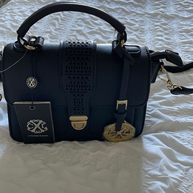 New Purse Never Used Black Black Crossbody Satchel With Metal Hardware, Trendy Black Satchel With Branded Hardware, Chic Black Satchel With Metal Hardware, Navy Blue Purse, White Shoulder Bag, Blue Handbags, Blue Purse, White Tote, Black Leather Skirts