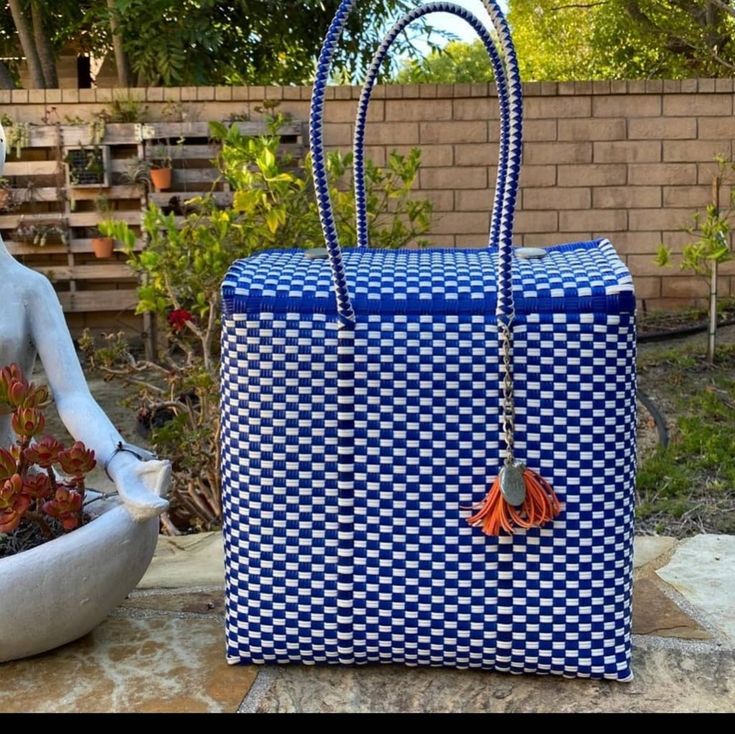 New, The Bag For The Summer, Perfect Bag For Beach, Pool, Winery Or Just A Regular Day. The Bag Has Closed Magnetic Top . Long Handles. Approx. Measurements 13.5x13x6 Inches.. All Sales Are Final.. White Square Bucket Bag For Travel, Blue Handwoven Bucket Bag, Rectangular White Beach Bag For Shopping, Blue Tote Beach Bag With Removable Pouch, White Rectangular Woven Bucket Bag, Woven Rectangular White Bucket Bag, White Woven Rectangular Bucket Bag, Blue Square Handwoven Shoulder Bag, White Woven Rectangular Bag