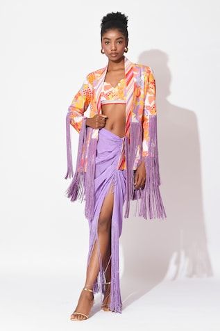 Orange and lavender crop top with floral print. Paired with floral printed jacket with fringe detailing and ruched skirt detailed with fringes on hem. - Aza Fashions Fitted Sets With Tassels For Spring, Fitted Spring Sets With Tassels, Fitted Tassel Sets For Spring, Lavender Crop Top, Embellished Skirt, Printed Jacket, Ruched Skirt, Cut Work, Top Pattern