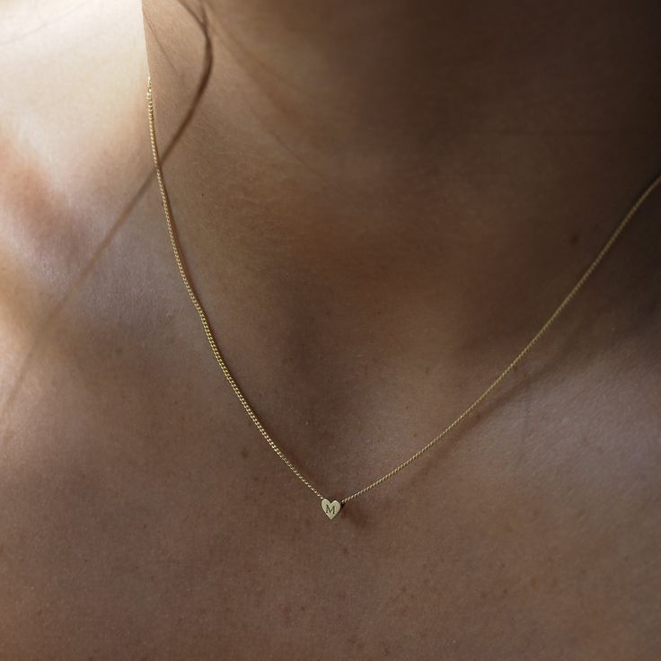 T I N Y ∙ I N I T I A L ∙ H E A R T ∙ N E C K L A C E The most unique jewelry you can find, the perfect gift for you or your loved one. W H Y ∙ Y O U 'L L ∙ L O V E ∙ I T• It's dainty and can be worn every day• A special piece you'll treasure for life• High-quality materials and attention to detail. • Tarnish proof, Waterproof, and Hypoallergenic • Replacement Guarantee and Fade proof warranty D E T A I L S • Material: Available in The Highest Quality 14K Gold Vermeil, 14K Rose Gold Vermeil, or Initial Heart Necklace, Tiny Heart Necklace, Dainty Initial Necklace, Custom Initial Necklace, Heart Charm Necklace, Solid Gold Necklace, Dainty Gold Necklace, Jewelry Studio, Tiny Heart