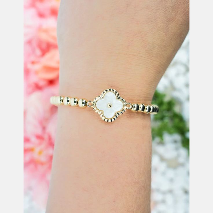 This Sweet And Dainty Bracelet Is Perfect For Just About Any Outfit And For Any Occasion. * Round Gold Tone Metal Beads * Textured Clover Shaped Frame And Tiny Metal Bead Center * Faux Smooth Pearl Like Stone * 5/8” Clover Shaped Accent * 7” Band * Easy On And Off With Comfort Stretch Band White Dainty Flower Shaped Beaded Bracelets, White Delicate Beaded Bracelet, Delicate White Flower Bracelets, Elegant White Beaded Stretch Bracelet, Dainty White Round Beads Stretch Bracelet, Dainty White Stretch Bracelet As Gift, Delicate White Flower Shaped Beaded Bracelets, Delicate White Flower Beaded Bracelets, White Hypoallergenic Pearl Bracelet