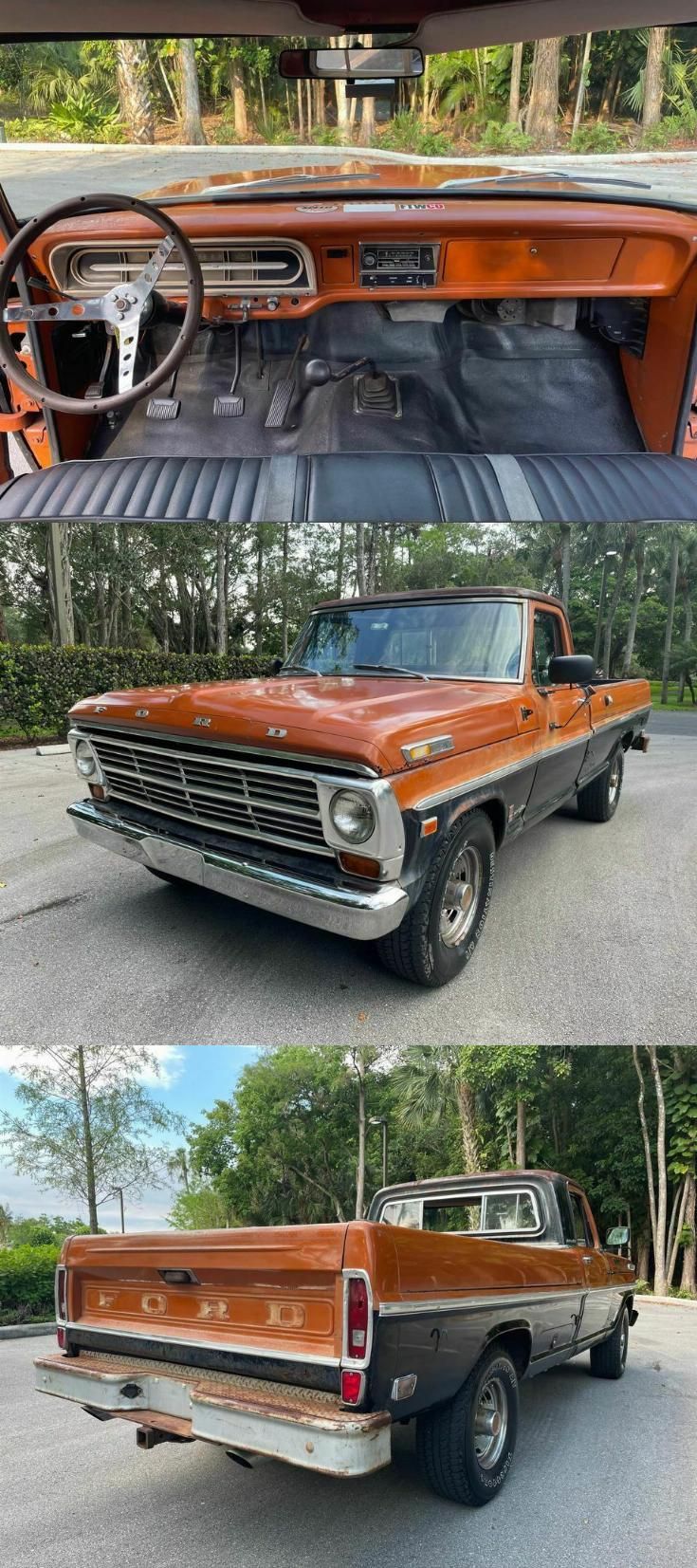 an orange truck parked in a parking lot next to another vehicle with the door open