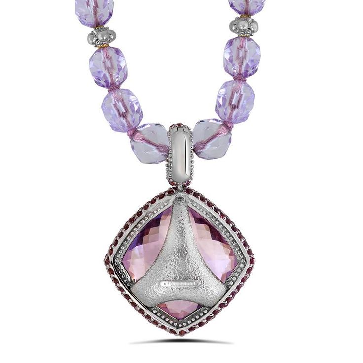 The Royal Collection is inspired by an intricate mosaic of the royal palaces around the world. From exotic Marrakesh and colorful Barcelona, to the magical islands of Greece, it reminds us that we’re all descendants of kings. Handmade in NYC. One of a kind. Price includes 18-inch strand of amethyst beads. For additional wearability and pricing options, please refer to pendant and bead options or contact us. One of a kind. Enhancer dimensions: 41 mm L by 29 mm W. Metal: 18 karat white gold. Rose Luxury Silver Necklace With Gemstones, Luxury White Gold Gemstones With Accents, Luxury Purple Pendant Necklace, Luxury Amethyst Gemstones With Accent Stones, Luxury Purple Diamond Necklace, Luxury Faceted Pendant Jewelry, Exquisite Amethyst Pendant Necklace, Luxury Amethyst Necklace For Formal Occasions, Silver Briolette Diamond Cut Jewelry