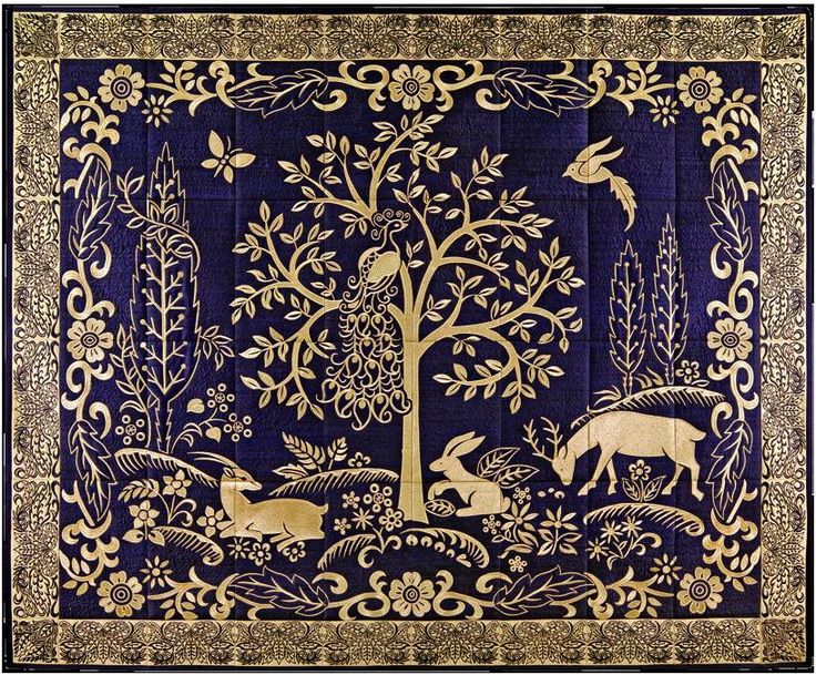 the golden tapestryry book cover with an image of deer and tree on it, in gold