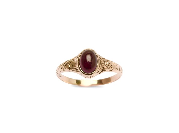 Check out this darling garnet cab, set into an etched rosy gold 10k band. This handsome ring features a swirling design that arcs all along a tapered band. The center stone features a deep merlot garnet. There is an inscription on the inside of the ring that is hard to make out but is likely a commemorative dedication of some kind. The kind of quintessential Victorian ring everyone is on the hunt for- a classic!. Senior Rings, Garnet Gold Ring, Promise Ring Gold, Victorian Style Rings, Ornate Ring, Concert Fit, Garnet Engagement Ring, Victorian Ring, Cute Engagement Rings