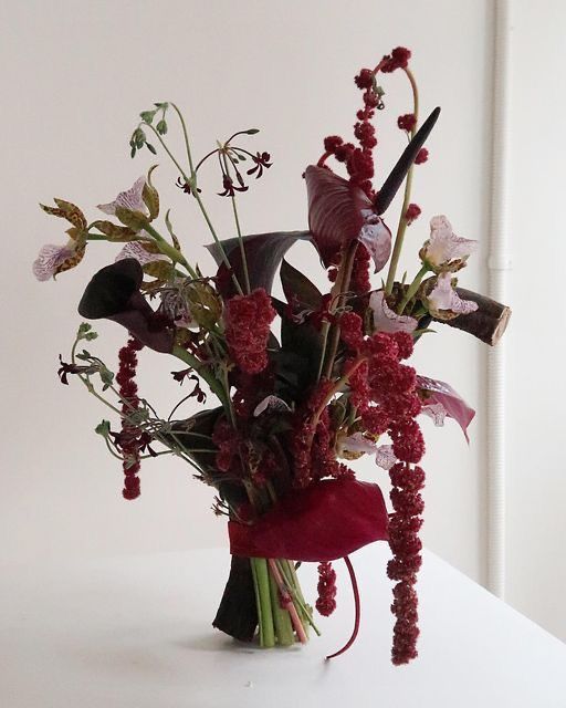 a bouquet of flowers is sitting on a table