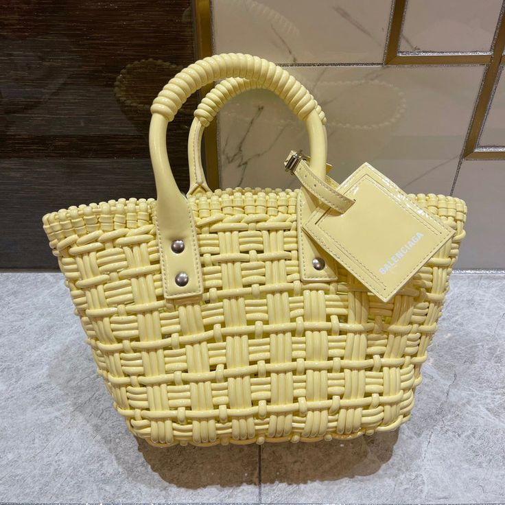 Size: 17cm*26cm*15cm OR 32cm*13cm*40cm It comes with Dust box, Care manual, Tag, and Paper bag. Luxury Yellow Rectangular Bucket Bag, Yellow Square Box Bag With Top Carry Handle, Modern Box Bag With Braided Handles For Shopping, Large Capacity Yellow Bucket Bag, Yellow Large Capacity Bucket Bag, Modern Yellow Tote Box Bag, Modern Yellow Box Bag For Daily Use, Shopping Rectangular Box Bag With Braided Handles, Yellow Box Bag For Shopping