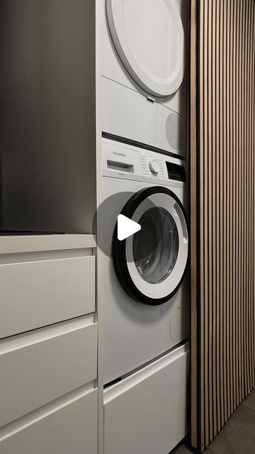 a washer and dryer sitting next to each other