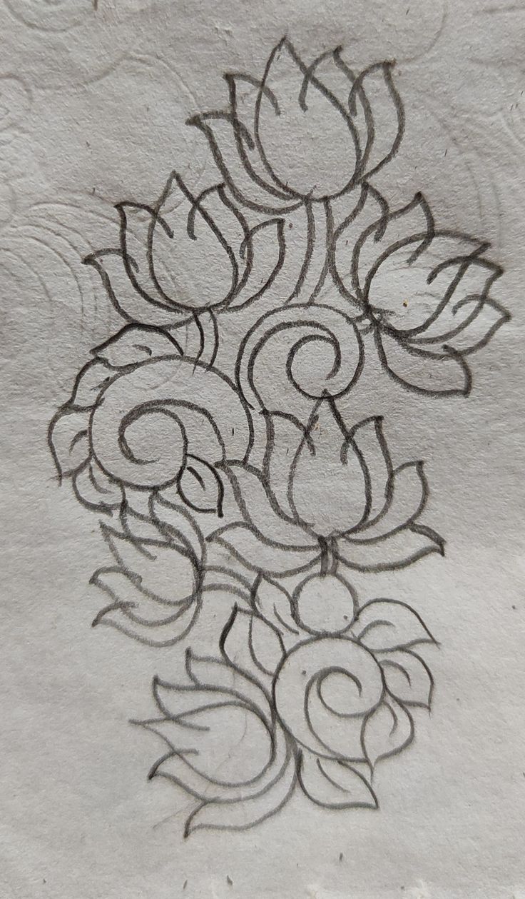 a drawing of flowers on the side of a wall