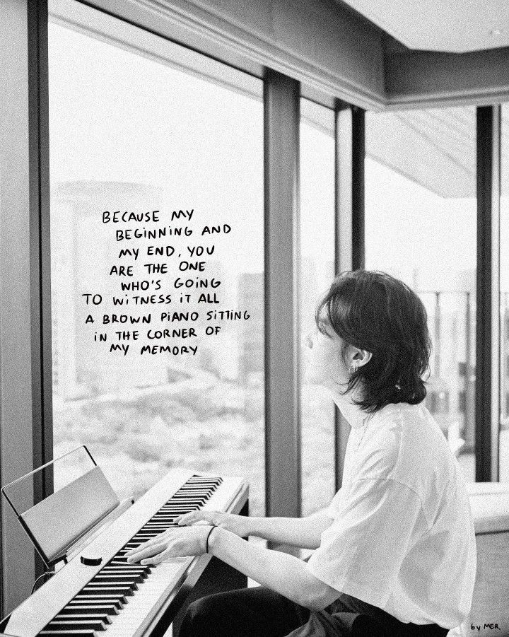 a woman sitting at a piano looking out the window with an inspirational note written on it