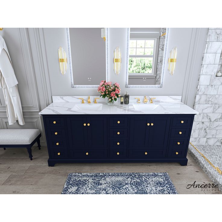 a bathroom with two sinks, mirrors and a rug in front of the bathtub